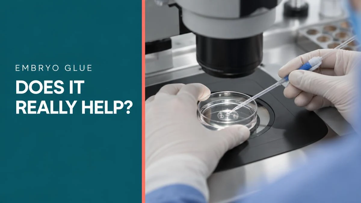 An embryologist preparing an embryo in a transfer medium under a microscope.